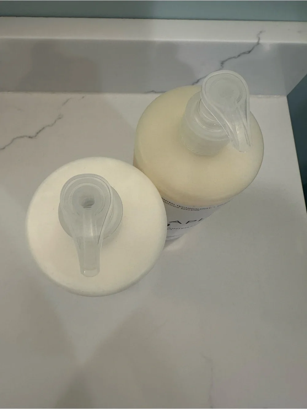 OLAPLEX No.4 & No.5 Bond Maintenance Shampoo and Conditioner - White Cream